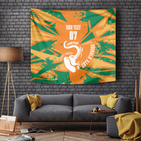 Custom football tapestry with orange and green rays pattern, white elephant and champion text