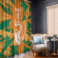 Custom window curtain with orange, green, and tan geometric pattern plus elephant silhouette