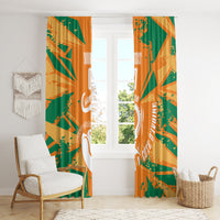 Custom window curtain with orange and green print, featuring elephant graphic and text