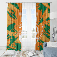 Football custom window curtain panels in orange and green with elephant silhouette and stripes