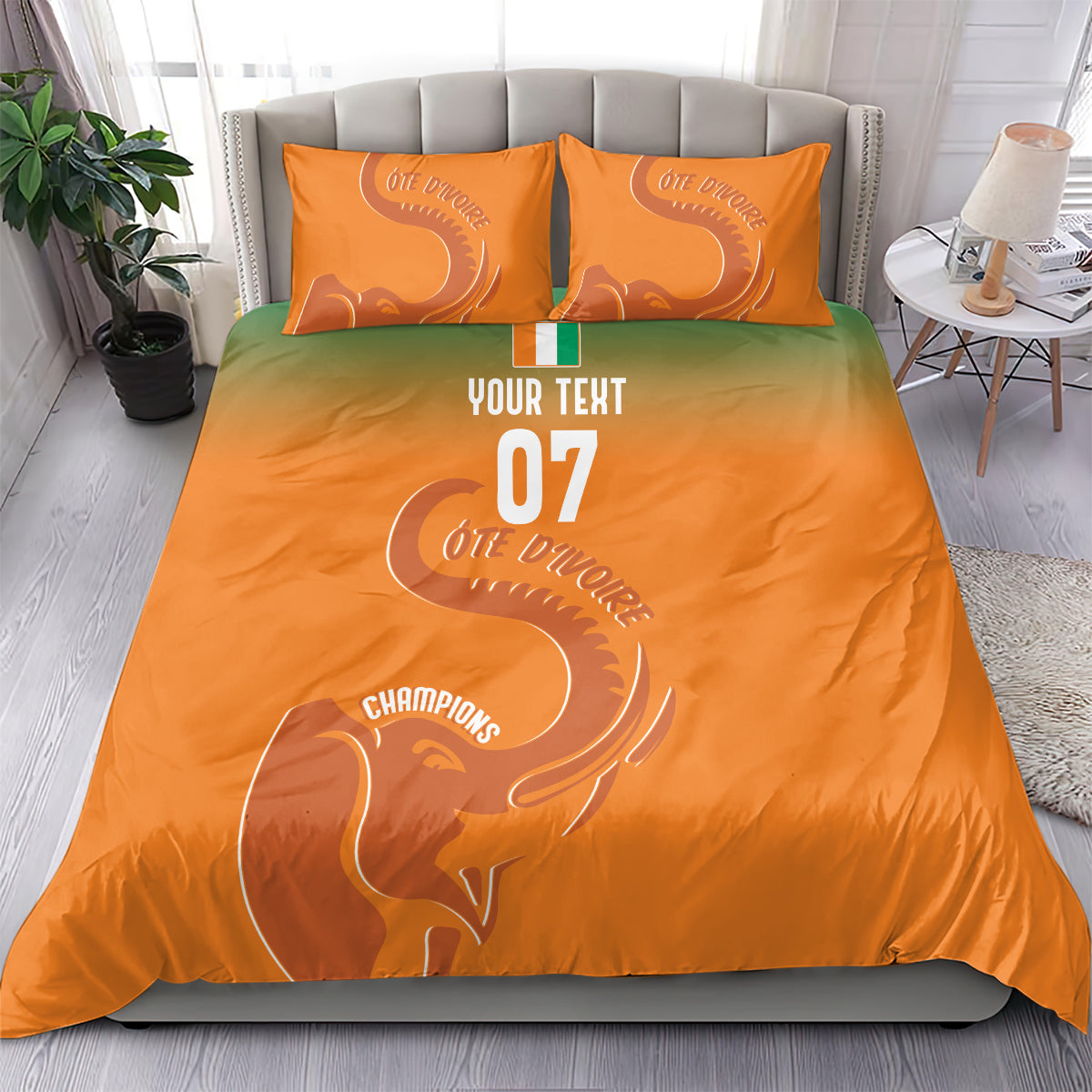 Orange bedding set with elephant design, “YOUR TEXT,” and number “07” on duvet