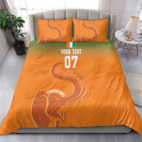 Orange bedding set with elephant design, “YOUR TEXT,” and number “07” on duvet