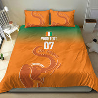 Orange custom bedding set featuring elephant graphic, “YOUR TEXT,” and “07”