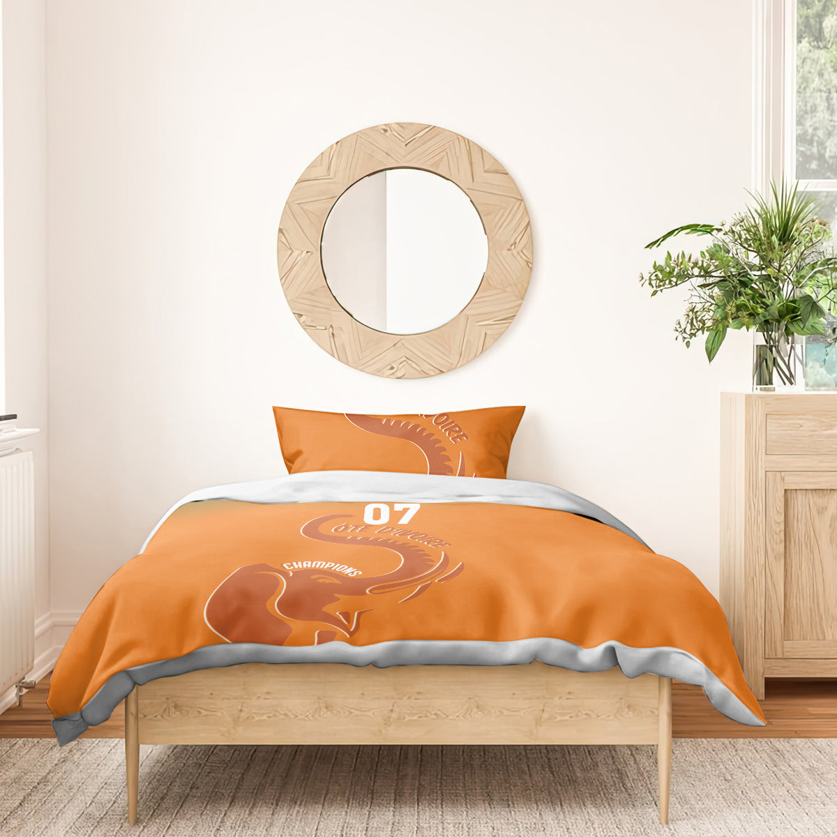 Orange duvet and pillow set with elephant graphic, “YOUR TEXT,” and “07”