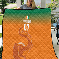 Orange quilt with green border, diamond quilting, elephant graphic and 'Champions' text