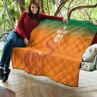 Orange quilt with green top, diamond quilting, elephant graphic and 'YOUR TEXT 07'