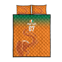 Orange quilt bed set with green gradient, elephant motif and two matching pillows
