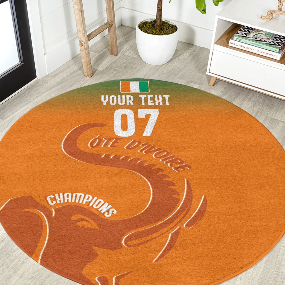 Round orange carpet with white football graphic, “YOUR TEXT 07” and “CHAMPIONS”