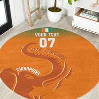 Round orange carpet with white football graphic, “YOUR TEXT 07” and “CHAMPIONS”