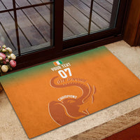 Custom orange rubber doormat with green border, elephant graphic and 'CHAMPIONS' text