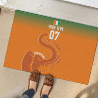 Custom orange rubber doormat with green top border, elephant graphic and 'CHAMPIONS'