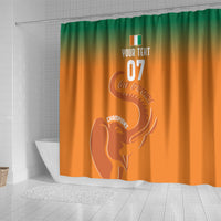 Orange and green gradient shower curtain with elephant face graphic and custom text