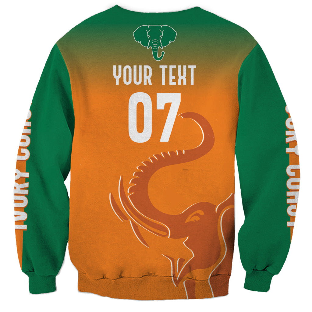 Green and orange sweatshirt back with YOUR TEXT 07 and elephant artwork
