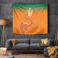 Orange rectangular wall tapestry with green top border and white elephant trophy design