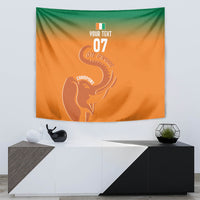 Orange wall tapestry with green top and centered white elephant trophy silhouette