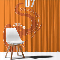 Orange window curtain with green top gradient and football elephant graphic design