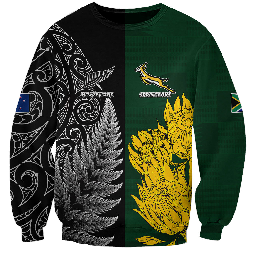 Unisex rugby sweatshirt in dark green and black with yellow flowers and silver fern print