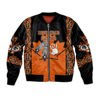 Kids orange-and-black bomber jacket with full-zip front and tribal sleeve print, slogan