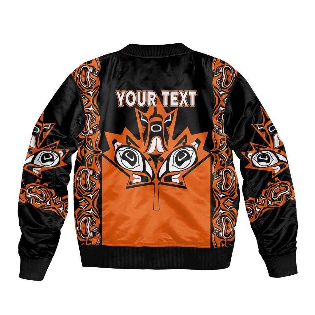 Kids orange-and-black zip bomber jacket with large 'YOUR TEXT' graphic on front