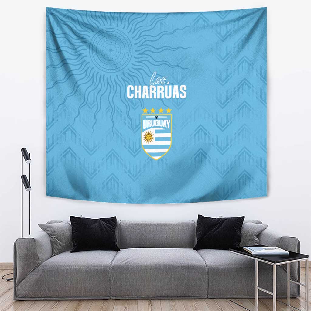 Sky blue Uruguay football tapestry with crest and 'Los Charruas' text