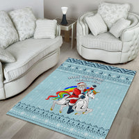 Turquoise Christmas unicorn area rug with Santa and rainbow unicorn illustration, decorative edge