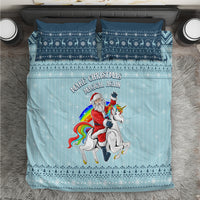 Turquoise Christmas bedding set with unicorn, Santa, and festive border; two pillow shams