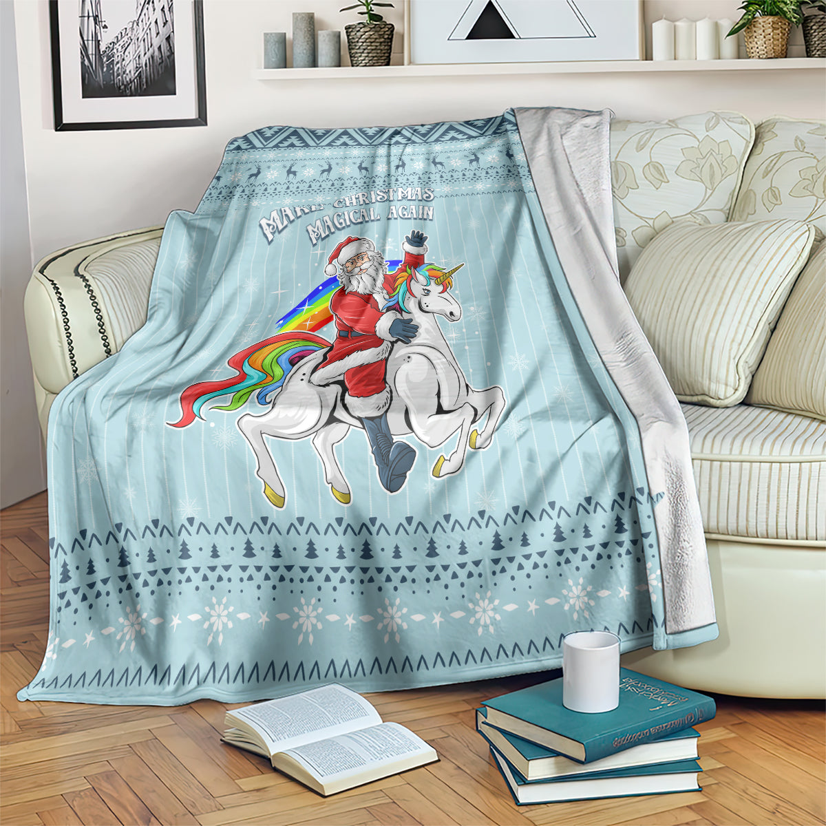 Turquoise Christmas blanket over armchair with unicorn graphic and festive patterns