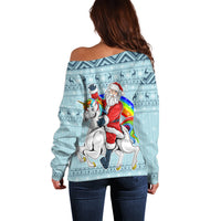 Back view turquoise off-shoulder sweater with Santa and rainbow unicorn print