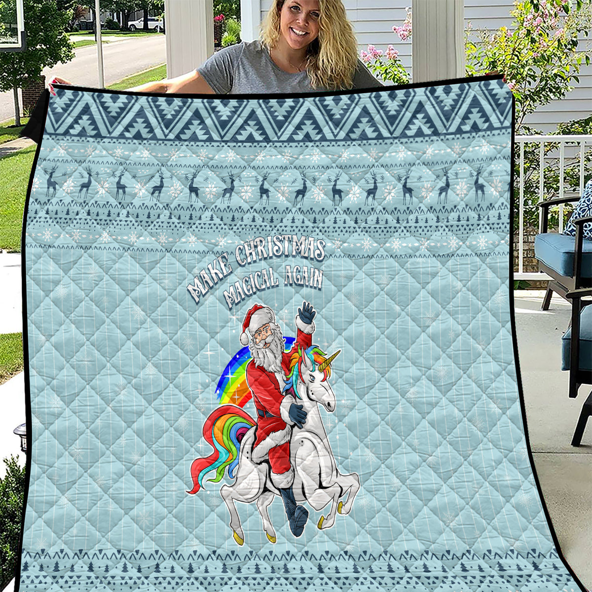 Turquoise quilt with unicorn and 'Make Christmas Magical Again' text, diamond quilting