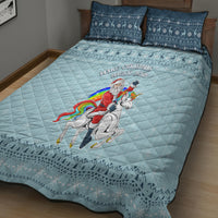 Turquoise unicorn Christmas quilt with matching navy snowflake pillowcases