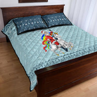 Turquoise unicorn Christmas quilt bed set with navy-trim snowflake pillowcases