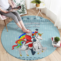 Turquoise round rug featuring Santa and unicorn with rainbow, 'Christmas Again' text