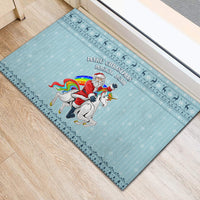 Turquoise rubber Christmas doormat showing Santa and unicorn with “Make Christmas Magical Again” text