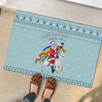 Turquoise rubber doormat with Santa and unicorn, “Make Christmas Magical Again” lettering
