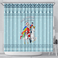 Turquoise Christmas shower curtain featuring unicorn rider, rainbow details, and slogan