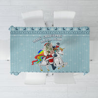 Turquoise Christmas unicorn tablecloth with central character and decorative text