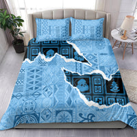 Turquoise and blue patterned comforter with festive graphics and two matching pillowcases