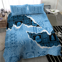 Turquoise and blue bedding set with patterned comforter and two matching pillowcases