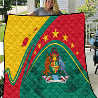 Grenada quilt with red, green, and yellow panels, star details, central coat of arms