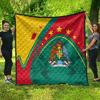 Quilt with Grenada flag design, star and crest center, red green yellow patchwork