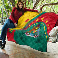 Grenada-themed quilt with red, green, and yellow star and emblem print