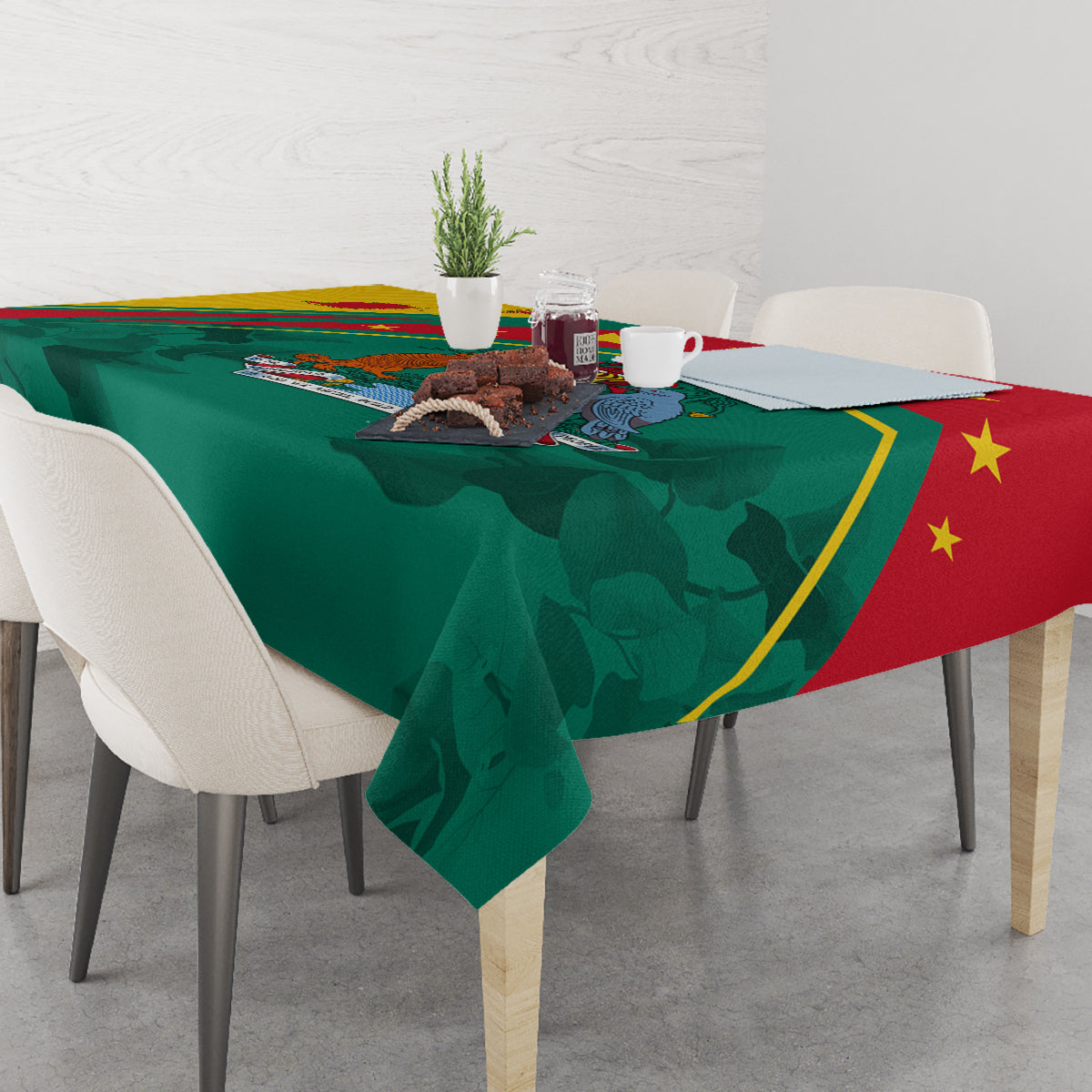 Tablecloth with green base and red corner, showing star motif and crest