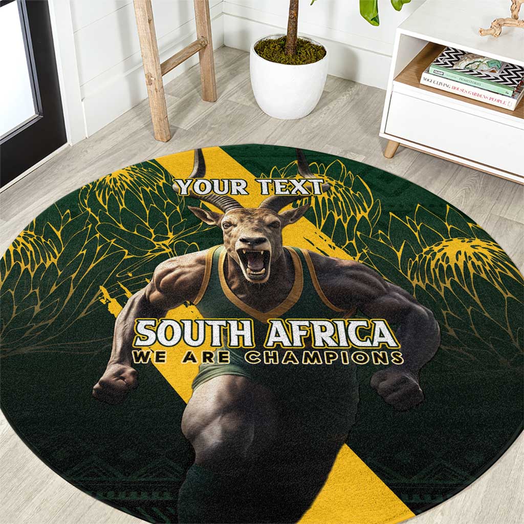 Dark green round rug showing “YOUR TEXT” above lion and “SOUTH AFRICA WE ARE CHAMPIONS”