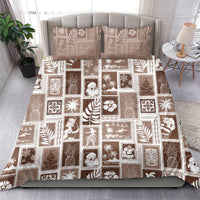 Brown patchwork duvet bedding set with island-themed square prints and two pillow shams