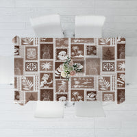Brown patchwork tablecloth with retro festive motifs and geometric blocks