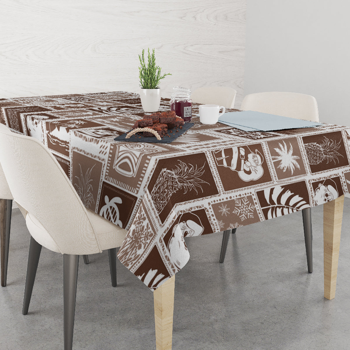 Brown retro patchwork tablecloth with festive icons on dining table surface