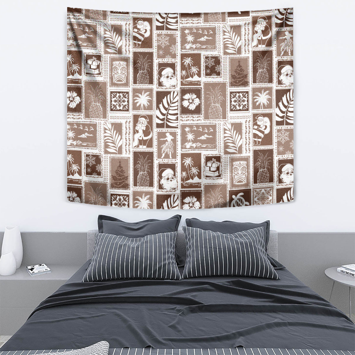 Brown patchwork wall tapestry with white holiday graphics arranged in grid blocks