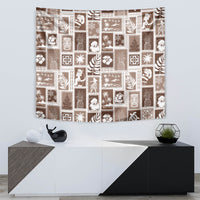 Brown patchwork tapestry with white festive icons in repeating square blocks