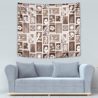 Brown patchwork wall tapestry with white decorative holiday squares and ornament motifs
