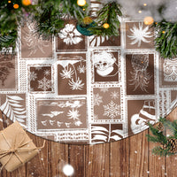 Brown tree skirt with white holiday patchwork blocks and curved scalloped border